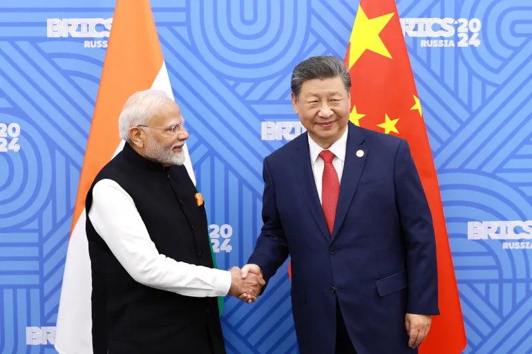 Modi meets Xi as India